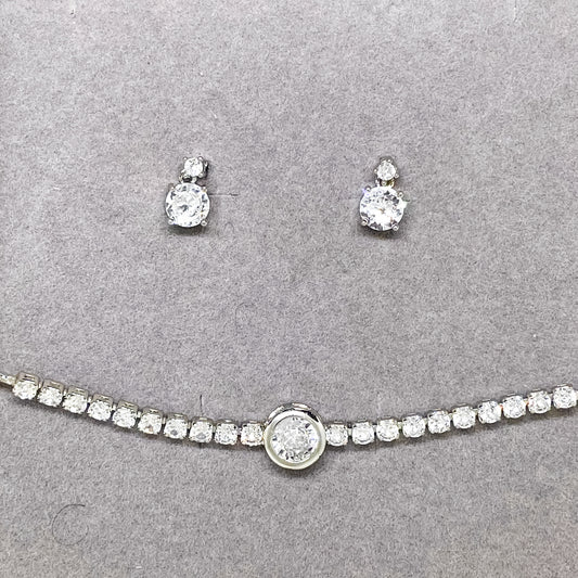 Ensemble de boucles d'oreilles et de bracelet en cristal argenté Celina