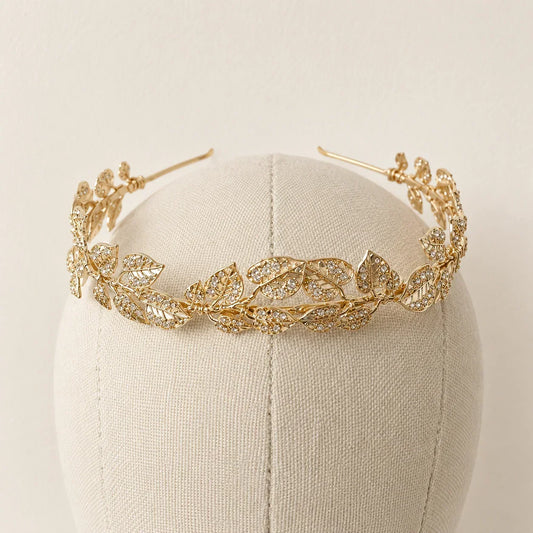 Lizabetha Parker Cleo gold leaf bridal headband with crystals on a mannequin head