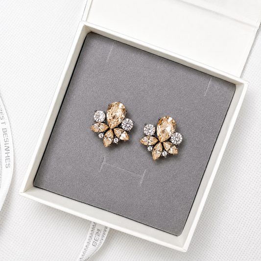 Champagne crystal floral stud earrings in gift box.