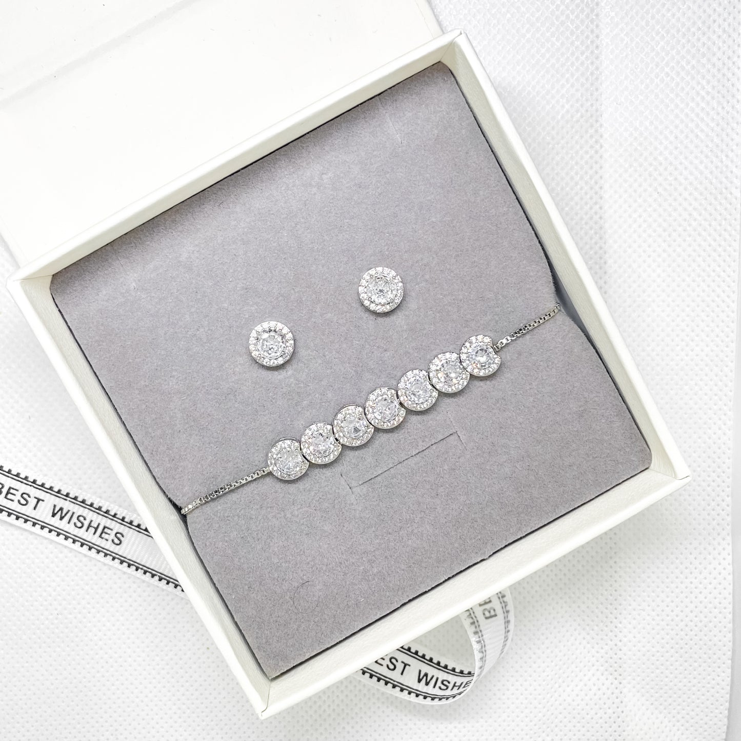 Ensemble de boucles d'oreilles et de bracelet en cristal argenté Selena