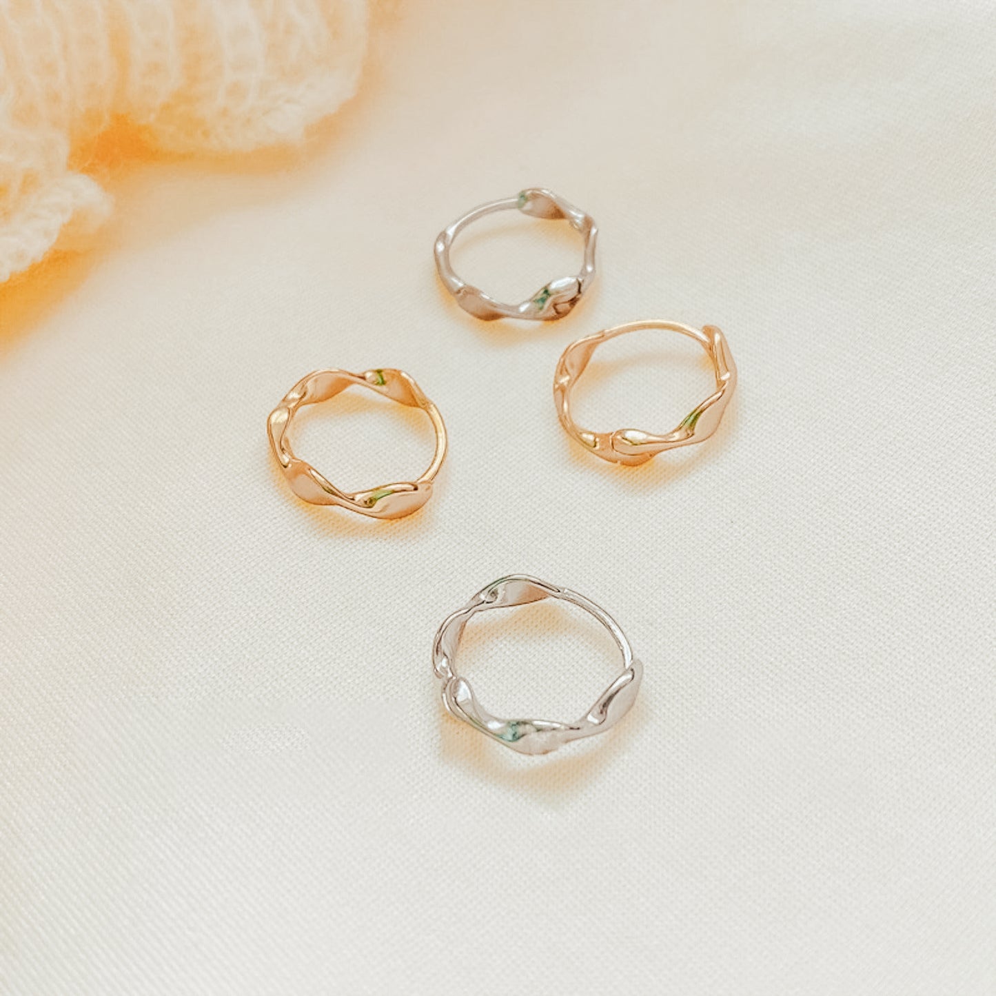 Zoe Twist Huggies Earrings