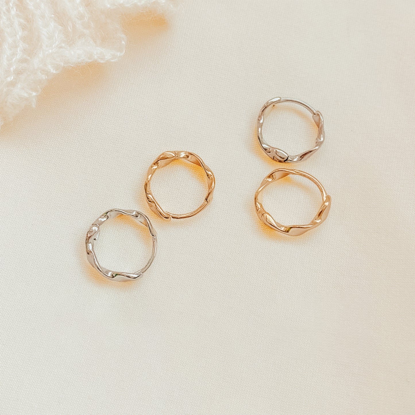 Zoe Twist Huggies Earrings