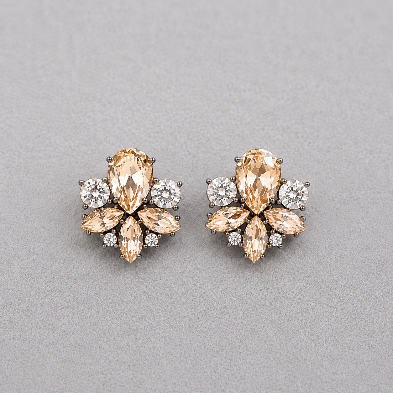 Champagne crystal floral stud earrings for weddings, bridesmaids and elegant everyday wear displayed on a light grey background